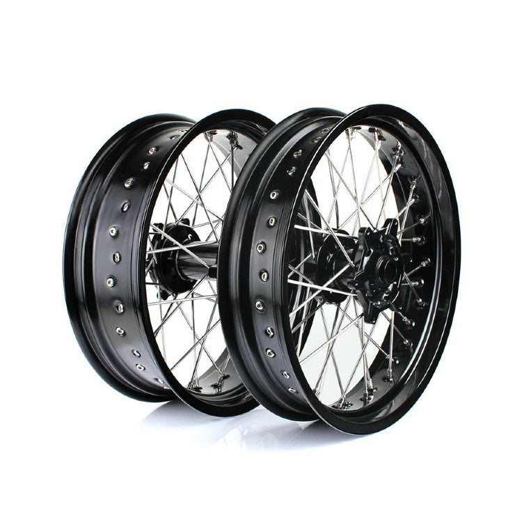 Two motorcycle wheels with black rims on a white background