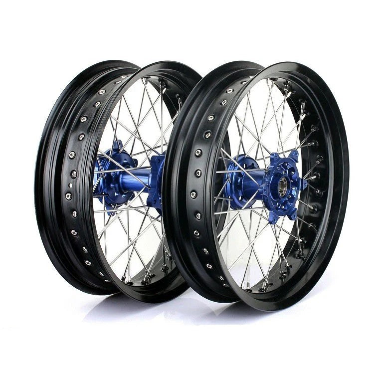 Two motorcycle wheels with black rims and blue hubs on a white background