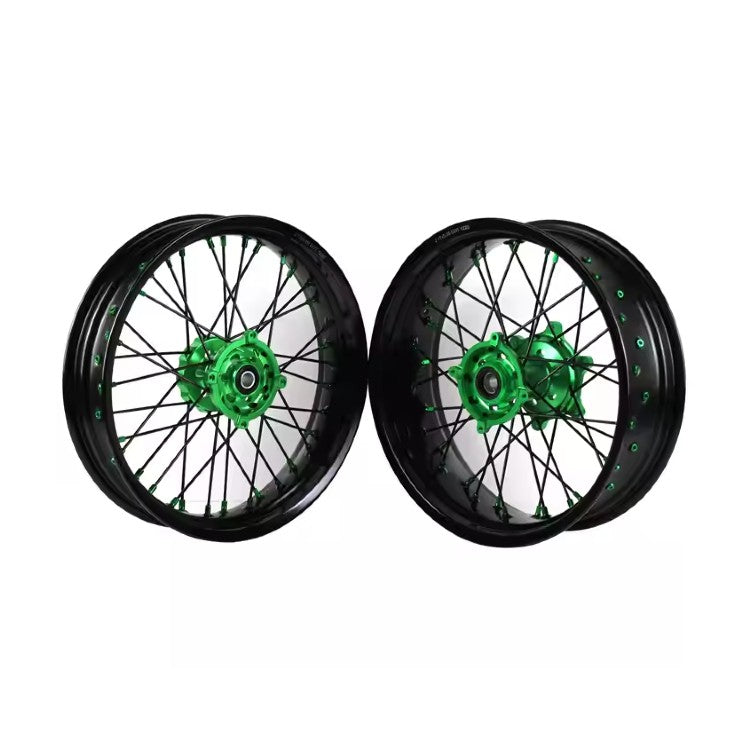 Two motorcycle wheels with green spoked hubs on a white background