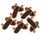 Set of six brake pads on a white background