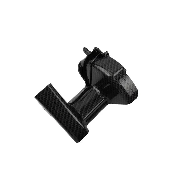 Black plastic component on a white background