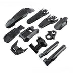 Collection of carbon fiber e bike parts on a white background