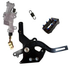 Mechanical parts including a black metal bracket, a gray cylindrical component, and a small black block with blue and red elements on a white background.