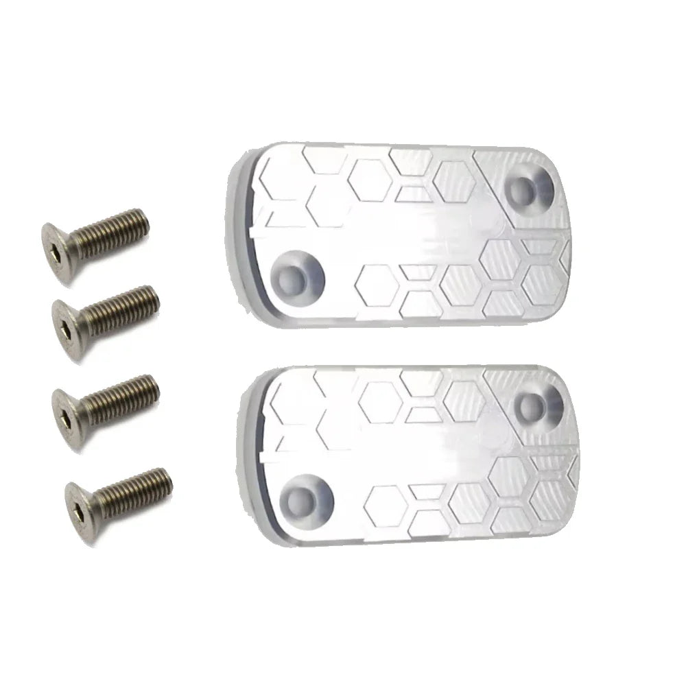 Two metallic footpegs with a honeycomb pattern and four screws on a white background