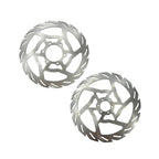Two metallic disc brake rotors on a white background