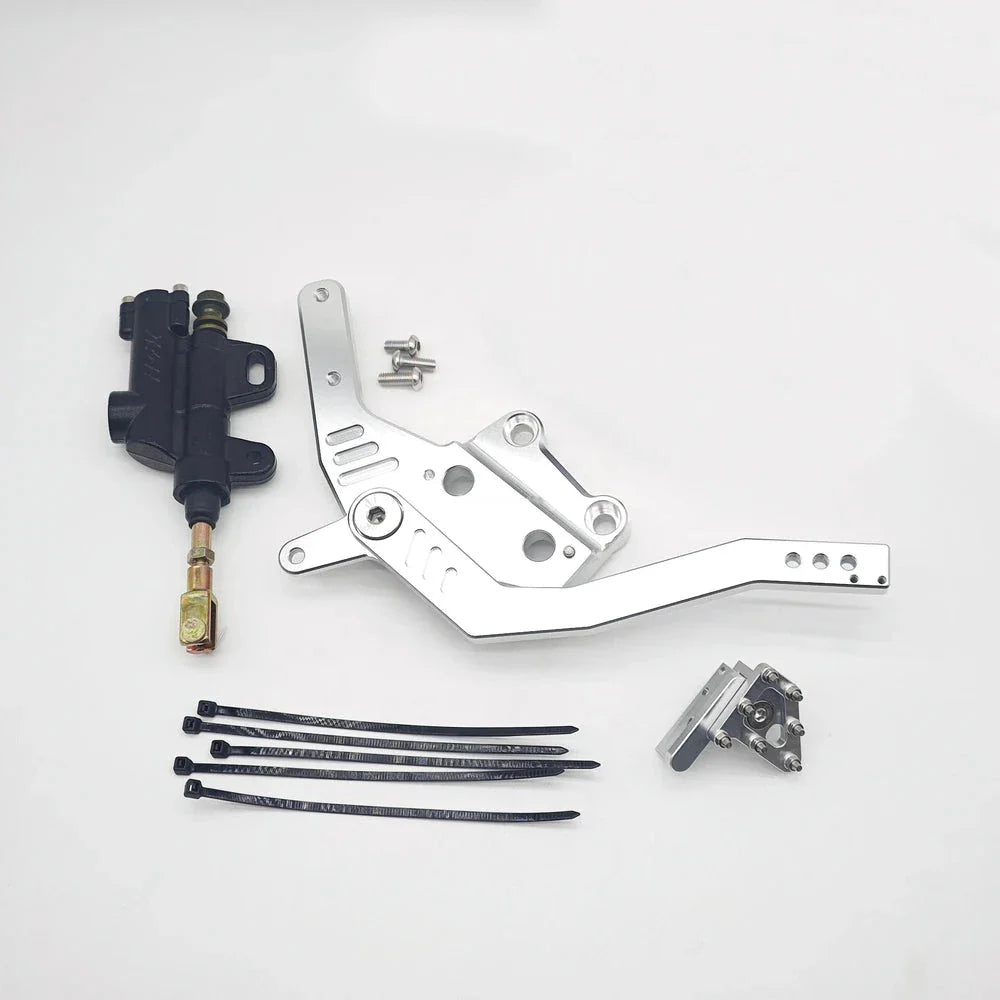 Mechanical parts including a silver lever, black cable, and metal components on a white background