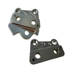 Two metallic brackets on a white background